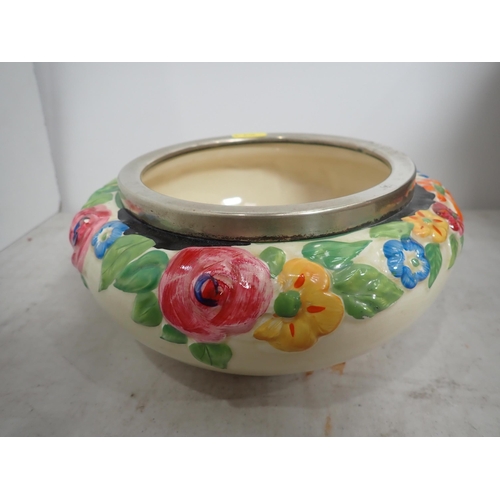 653 - A part Toilet Set decorated exotic birds and a Clarice Cliff Bowl moulded flowers