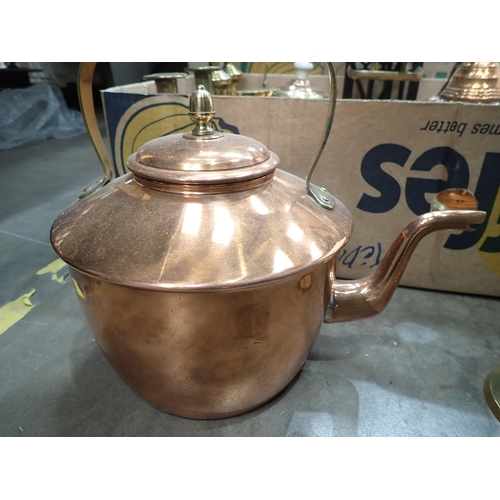 658 - A quantity of copper and brass ware including Kettles, Candlesticks, Companion Set and a Light Fitti... 