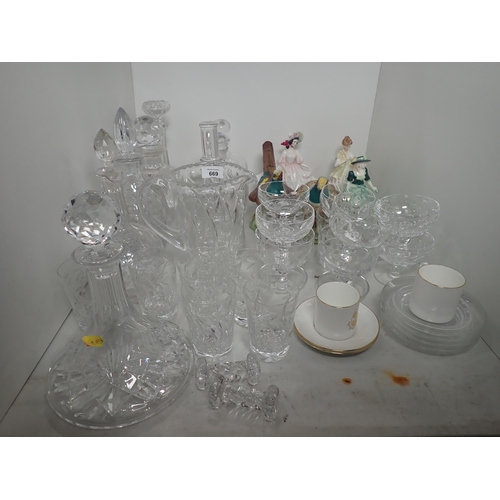 669 - A quantity of glassware including Decanters, a Jug, etc, three Figurines, two Figures of Pheasants, ... 