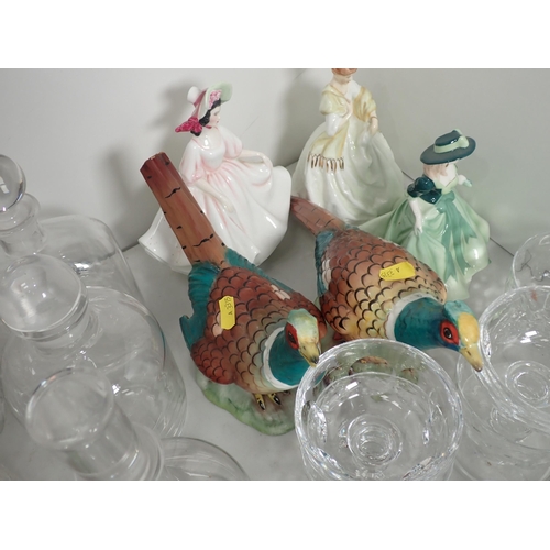 669 - A quantity of glassware including Decanters, a Jug, etc, three Figurines, two Figures of Pheasants, ... 