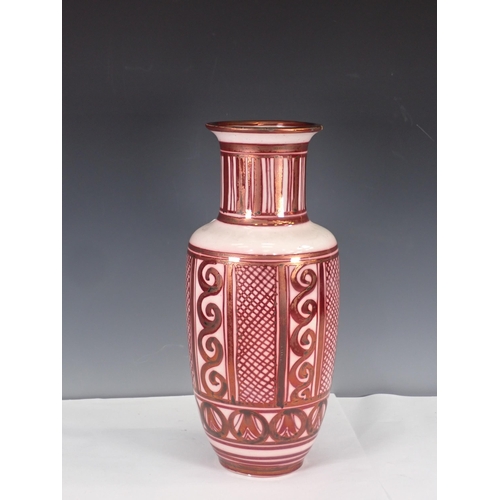 671 - A Hispano-Moresque type ruby lustre Vase, with design of swirls and lattice panels, 15 1/2in H