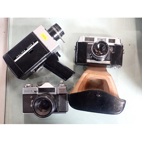 672 - A Super 8 Cine Camera, a Zenith 35mm Camera and a Mamiya Rank 35mm Camera in Case