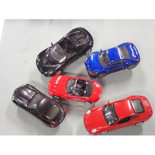 679 - A tray of 24 die cast model racing cars