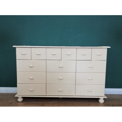 719 - A painted pine Kitchen Unit fitted six short frieze drawers above nine longer drawers 4ft 4in W x 2f... 