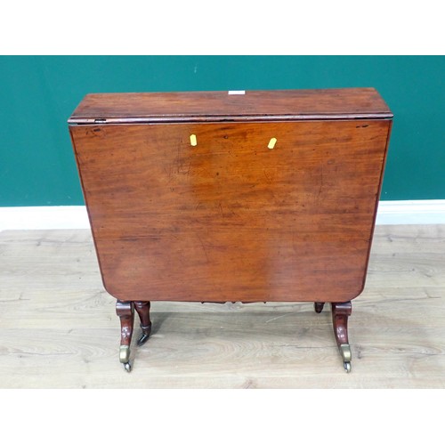 262 - A Victorian mahogany Sutherland Table on turned supports and out swept feet with brass casters 2ft 5... 