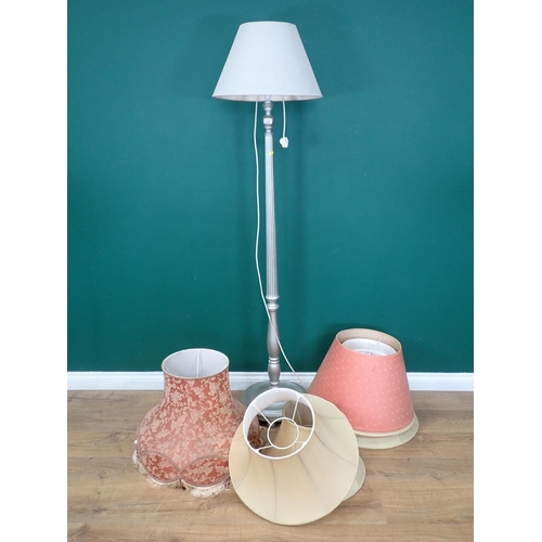 733 - A silver painted Standard Lamp and Shade (passed PAT) and five Shades