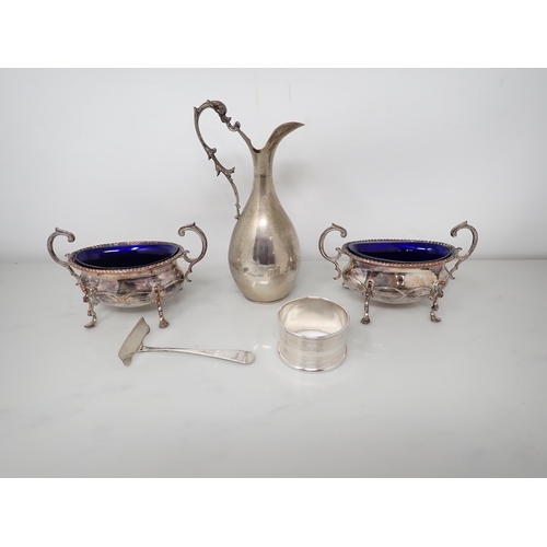 74 - A silver Pusher and a Napkin Ring, a small Continental silver Ewer and a pair of two handled oval Sa... 