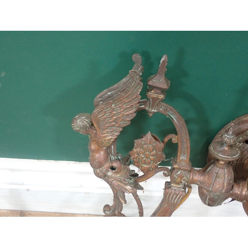 767 - A 19th Century brass two branch Wall Light with angel design and three other two branch Wall Lights