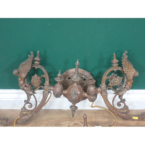 767 - A 19th Century brass two branch Wall Light with angel design and three other two branch Wall Lights