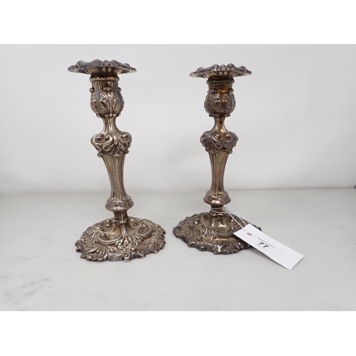 77 - A pair of George III silver Candlesticks with scroll decoration and engraved cockerel crests, Sheffi... 