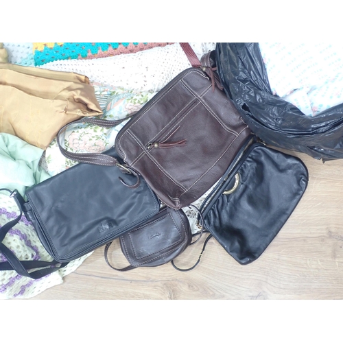 770 - Two bags of Blanket, leather Handbags and assorted Textiles