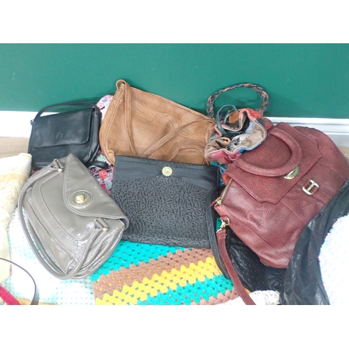 770 - Two bags of Blanket, leather Handbags and assorted Textiles