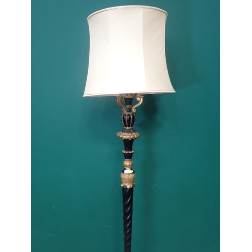 779 - An antique ebonised and gilded Standard Lamp and shade 6ft 2in H (failed PAT)