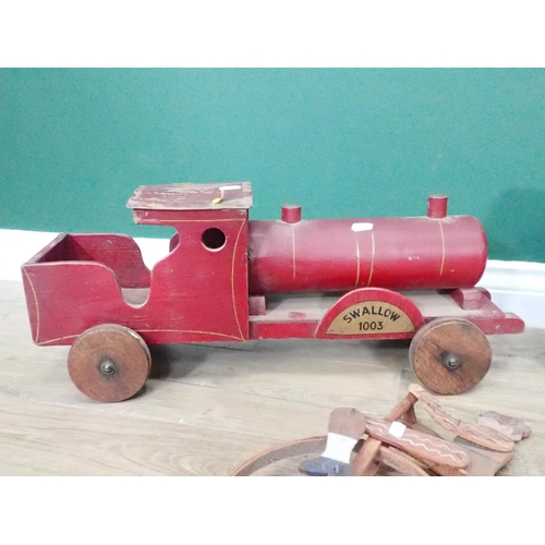 8 - A wooden Model of a Train, a wooden model House on wheels and a Penny Farthing Cyclist