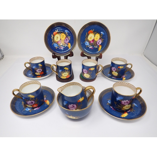 82 - A Crown Staffordshire Coffee Service for six, plus Jug and Bowl with bright floral design on a powde... 