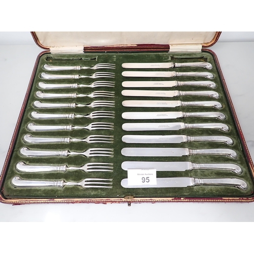 95 - Eleven George V silver hafted Cake Knives and Forks with pistol grips, Sheffield 1913, in case