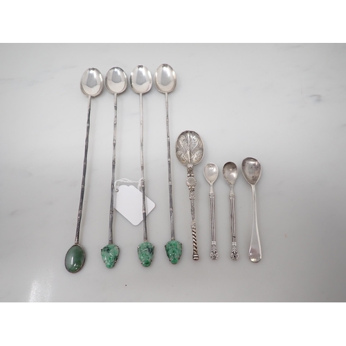 99 - Four Oriental Cocktail Spoons with green jade type hardstone finials, an Edward VII silver Spoon, Lo... 