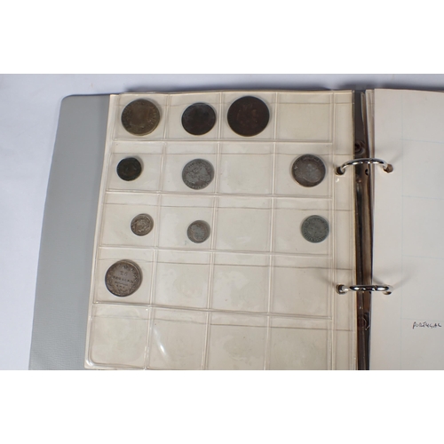 231 - An Album of World Coins, to include a Russia 1830 25 Kopeks, a France 1 Franc 1823W, and a selection... 