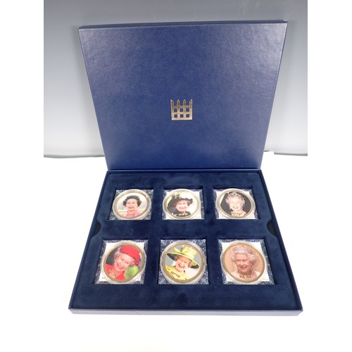 241 - A collection of boxed and carded British and World Coins, to include an Australia Anniversary Presti... 