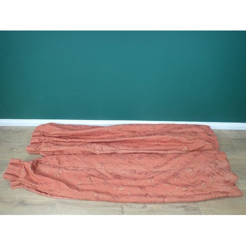 782 - A Pair of lined rust colour floral Curtains, 7ft 4in drop approximately x 6ft 6in W approximately