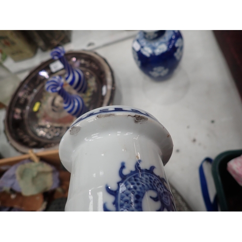 651 - A pierced metal Charger, a Chinese blue and white Vase with dragon design, 10in H, (chipped), a blue... 