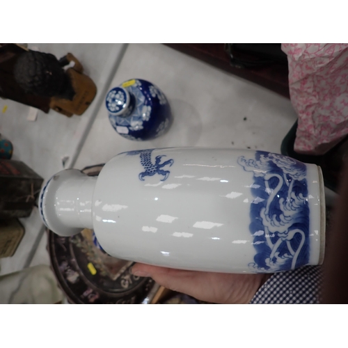 651 - A pierced metal Charger, a Chinese blue and white Vase with dragon design, 10in H, (chipped), a blue... 