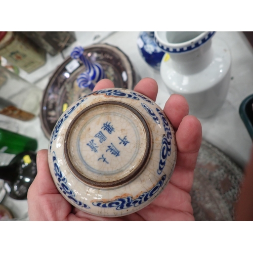 651 - A pierced metal Charger, a Chinese blue and white Vase with dragon design, 10in H, (chipped), a blue... 