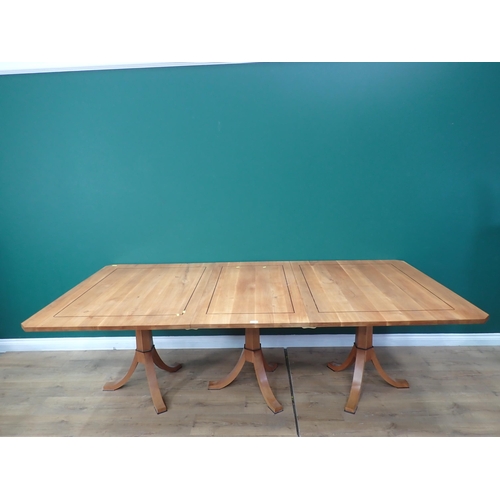 371 - A modern cherry wood and strung triple pedestal Dining Table, including two leaves, 7ft 11in L x 2ft... 