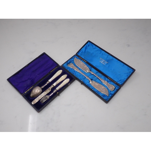 122 - A pair of Victorian Scottish silver Butter Knives, King's pattern, Edinburgh 1863, and a Christening... 