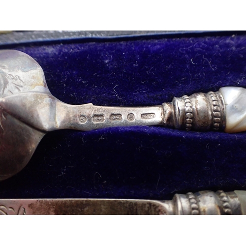 122 - A pair of Victorian Scottish silver Butter Knives, King's pattern, Edinburgh 1863, and a Christening... 