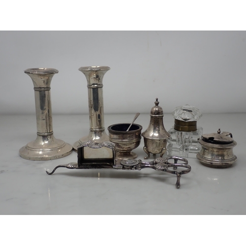 125 - A pair of Edward VII silver Candlesticks on circular bases, Birmingham 1905, three piece Condiment S... 