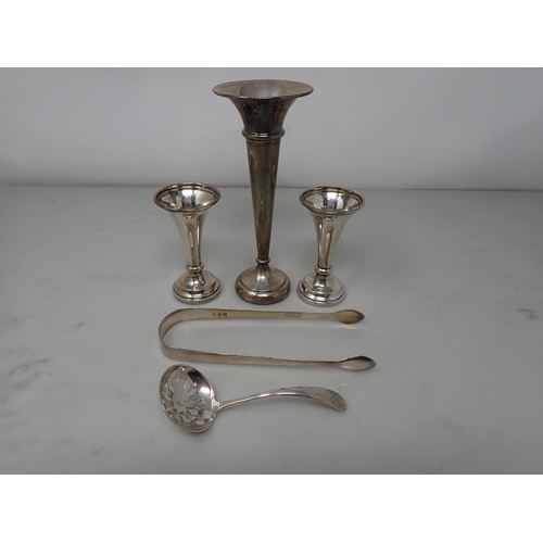 143 - A pair of George IV silver Sugar Tongs, London 1820, a Sifting Spoon, Birmingham 2000, and three sil... 