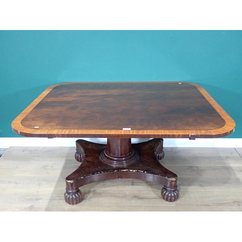 15 - A 19th Century walnut and satinwood crossbanded Breakfast Table on octagonal tapering column and con... 