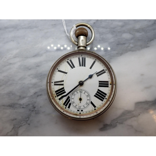 153 - A large open faced Pocket Watch the white enamel dial with roman numerals and subsidiary dial at 6 o... 