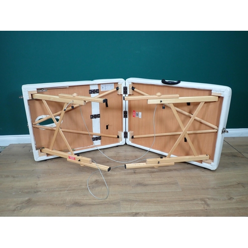 302 - An Earth Gear folding massage Table