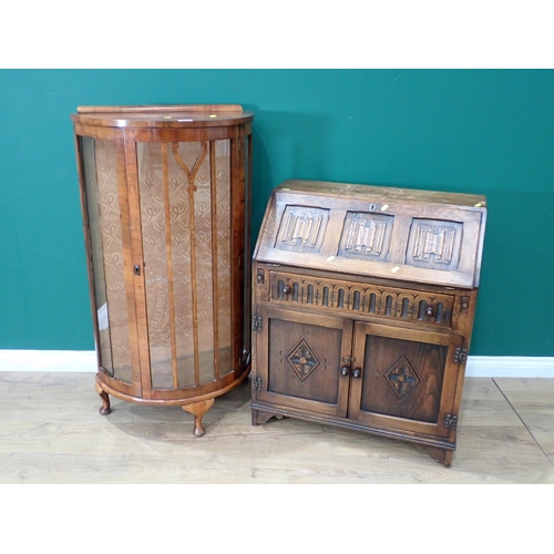 306 - A walnut veneered demi-lune Display Cabinet on cabriole feet 3ft 11in H x 2ft 2in W and an oak linen... 