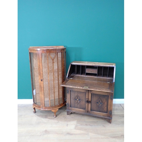 306 - A walnut veneered demi-lune Display Cabinet on cabriole feet 3ft 11in H x 2ft 2in W and an oak linen... 