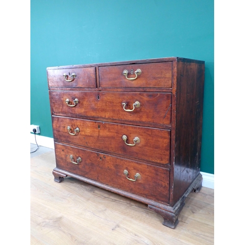 313 - A Georgian mahogany Chest of two short and three long drawers mounted upon ogee bracket feet 3ft 2in... 