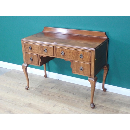 318 - A mahogany Dressing Table fitted four drawers mounted on cabriole supports 3ft 6in W x 2ft 7in H