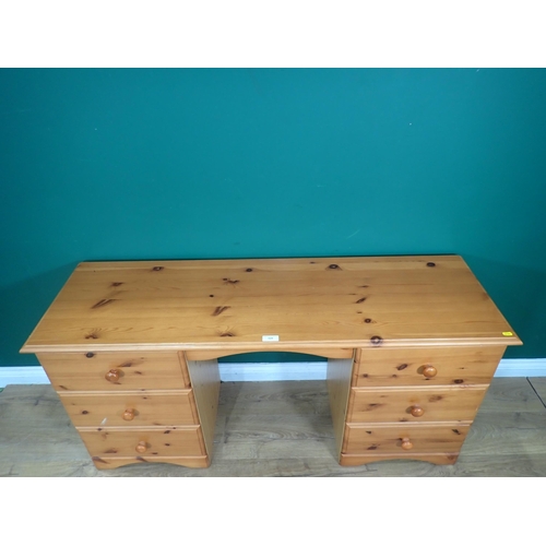 324 - A modern pine Desk fitted six drawers 4ft 8in W x 2ft 3in H