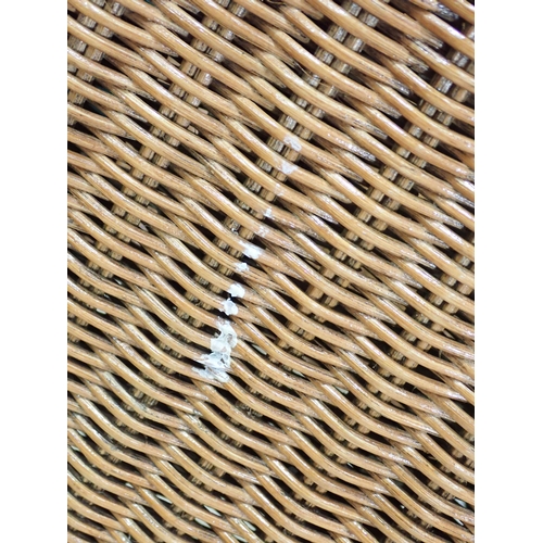 333 - A set of six wicker Dining Chairs with cream upholstered seats