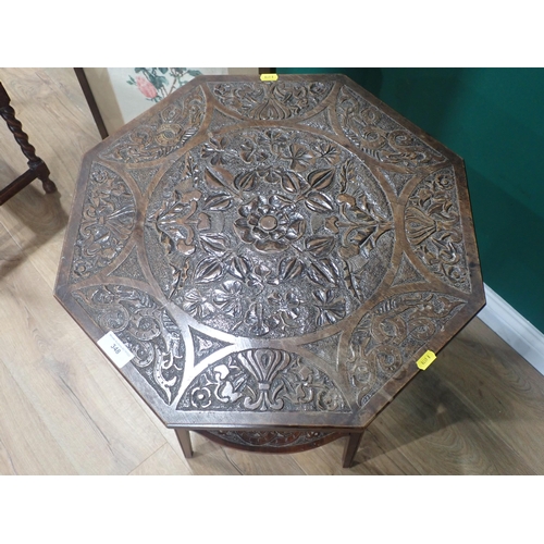 348 - A carved oak octagonal Occasional Table with thistle and leafage design, an oak Footstool and a Fire... 