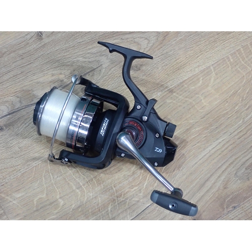 35 - Three Daiwa Windcast BR5000 Fixed Spool Reels with spare spools, Spods and Rod Rests in Nash Monster... 