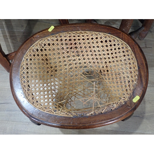 356 - An antique circular ash Stool, a mahogany cane seated Dressing Stool A/F, an oak two tier Occasional... 