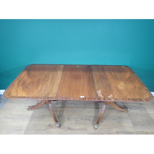 363 - A 1920's George III style mahogany and crossbanded twin pedestal Dining Table with spare leaf 6ft 6i... 