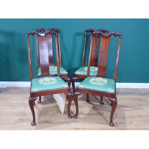 365 - A set of four mahogany splat back Dining Chairs on cabriole supports