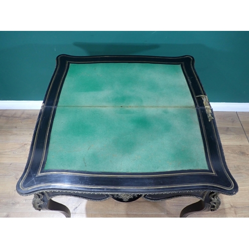 374 - A 19th Century ebonised and ormolu mounted fold over Card Table mounted on square cut cabriole suppo... 