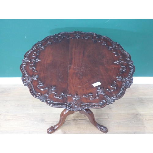 381 - A George II style mahogany Pillar Table with fleur du lis and ribbon carved top on spiral turned col... 