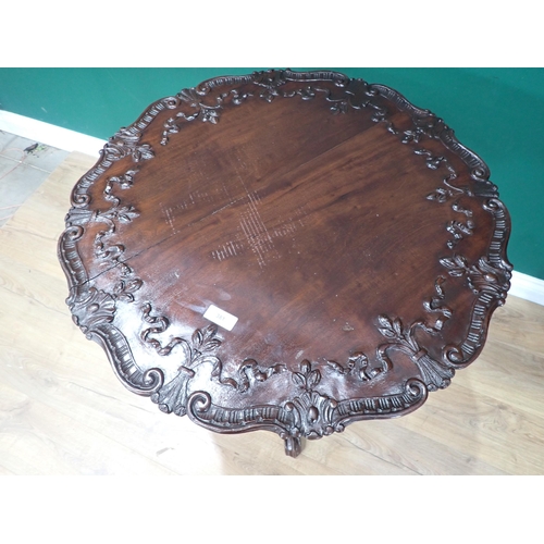 381 - A George II style mahogany Pillar Table with fleur du lis and ribbon carved top on spiral turned col... 