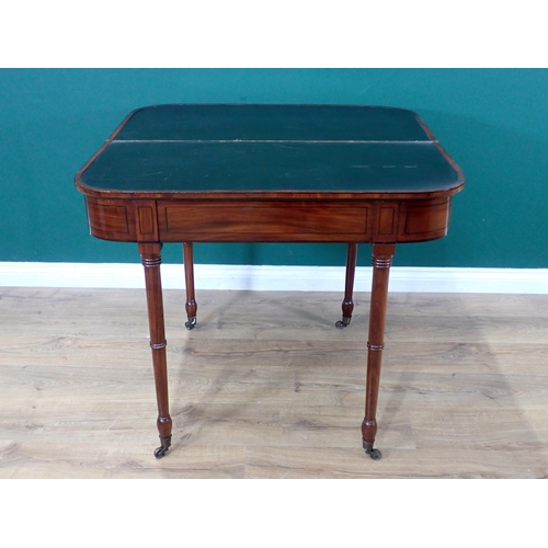 386 - A Georgian mahogany and ebony strung fold over Card Table with leather inset surface and mounted upo... 